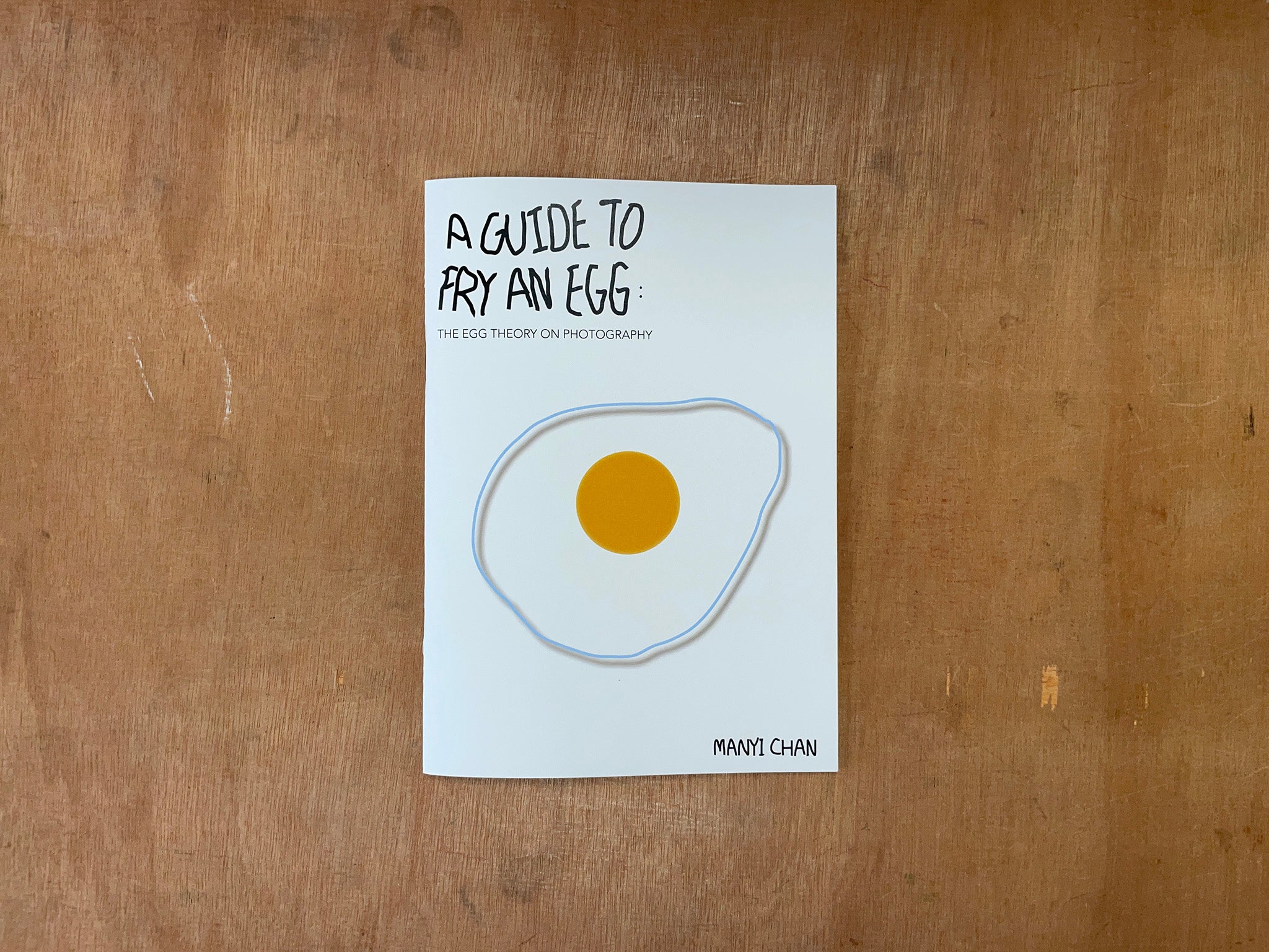 A GUIDE TO FRY AN EGG: THE EGG THEORY ON PHOTOGRAPHY by Manyi Chan