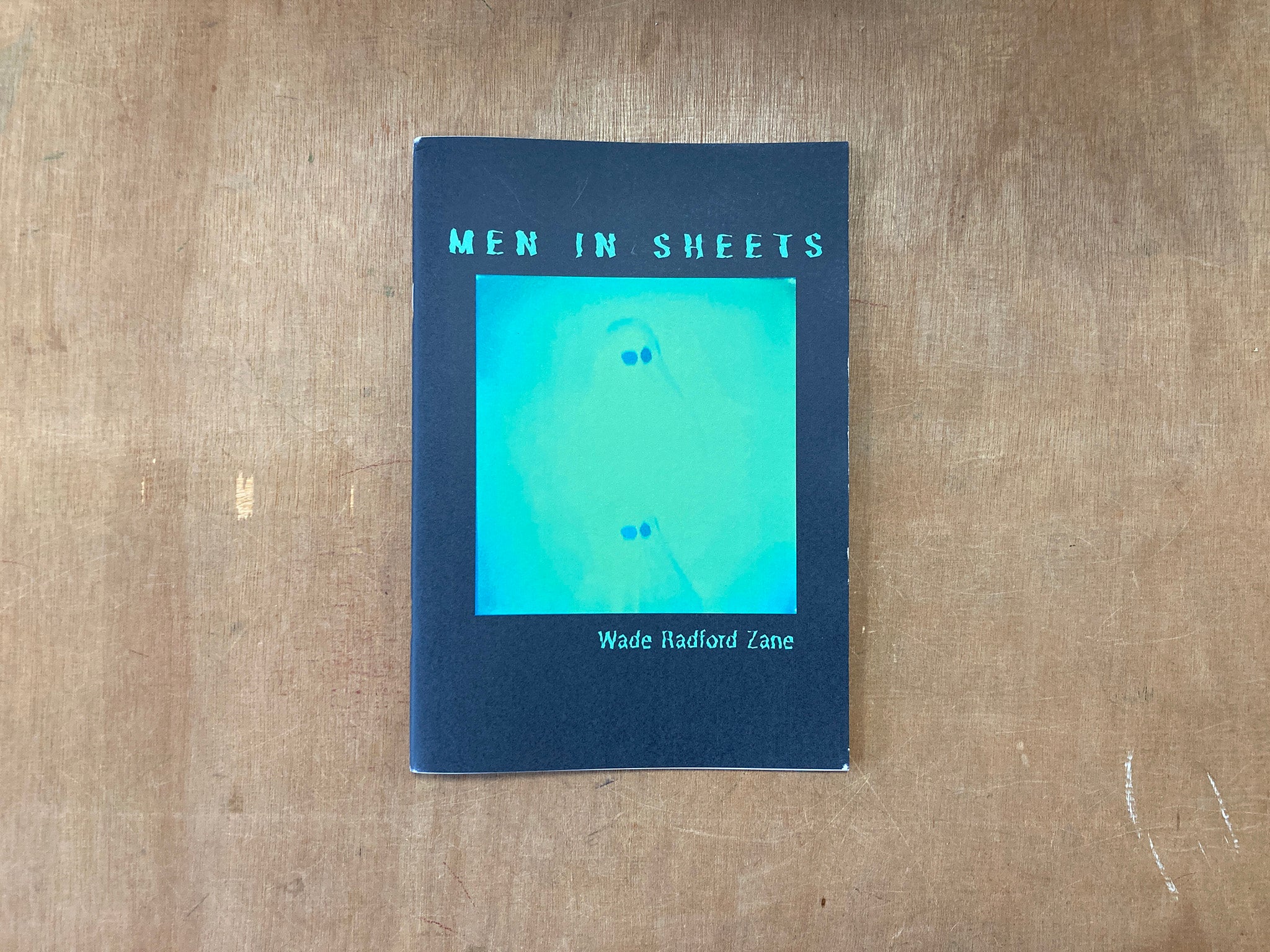 MEN IN SHEETS by Wade Radford Zane