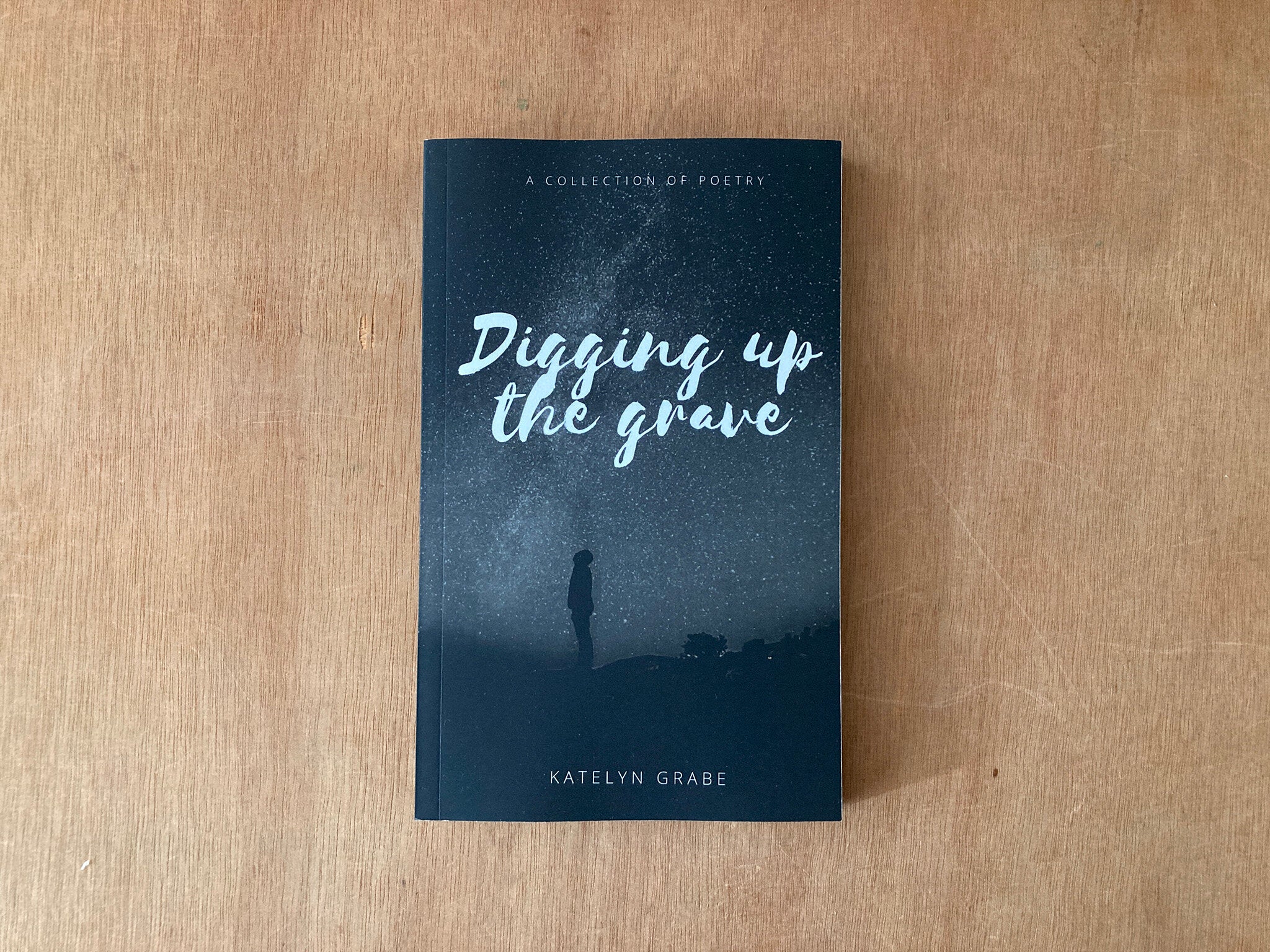 DIGGING UP THE GRAVE by Katelyn Grabe
